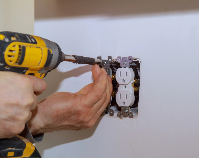man fixing electrical outlet summerville sc